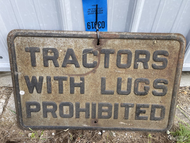 Tractors with lugs prohibited sign